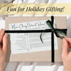 Printed botanical recipe card tied with a black ribbon and presented as a holiday gift. The image shows how a personalized family recipe can become a thoughtful Christmas keepsake, recipe exchange present or addition to a kitchen gift basket.