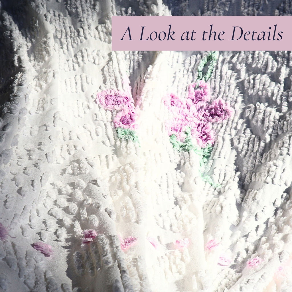 Raised lavender floral tufting on a vintage white chenille bedspread highlights the dimensional texture and exceptional craftsmanship. Perfect for cottage decor, farmhouse bedding, shabby chic interiors, romantic bedrooms, and vintage textile enthusiasts.