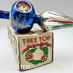 Close-up of vintage blue mercury glass Christmas tree topper with indented reflector detail and original box, showcasing mid century handblown holiday ornament craftsmanship from the 1960s.