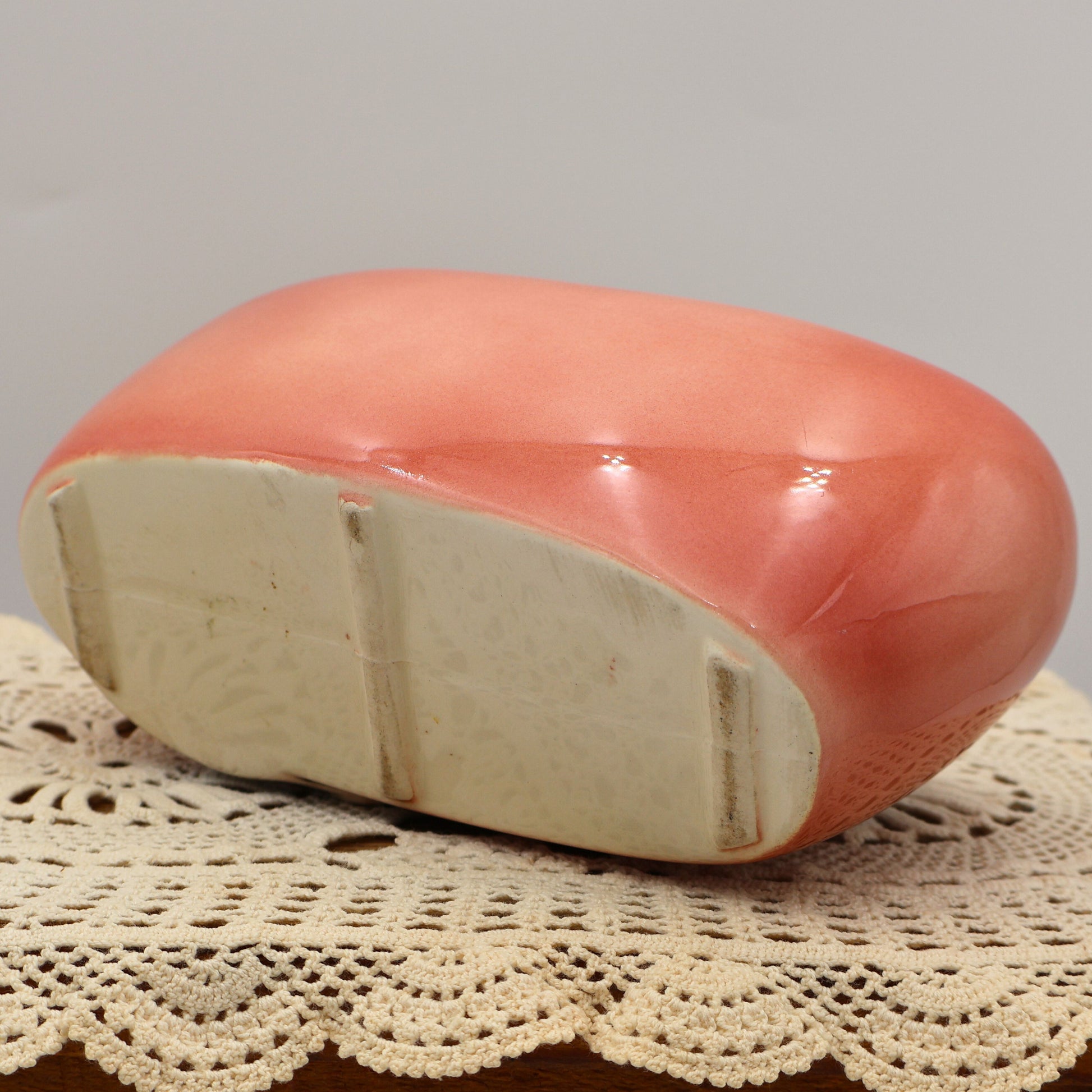 Bottom view of vintage Royal Copley planter showing ceramic base and original mid-century construction.