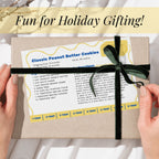 Salted Butter recipe card attached to a wrapped holiday gift with black ribbon. The playful printable turns a favorite cookie or baking recipe into a thoughtful Christmas keepsake, cookie exchange gift or baker's gift basket addition.