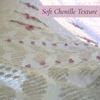 Angled view highlighting the soft woven chenille fabric and delicate lavender border on a vintage white bedspread. The luxurious texture and heirloom quality make it perfect for cottage decor, farmhouse bedrooms, romantic interiors, and vintage textile collections.