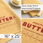 Yellow microfiber unsalted butter kitchen towel showing soft waffle texture, neatly hemmed edges and 16 x 25 inch sizing graphic. Novelty red typography dish cloth designed for bakers, chefs and quirky culinary kitchen decor lovers.