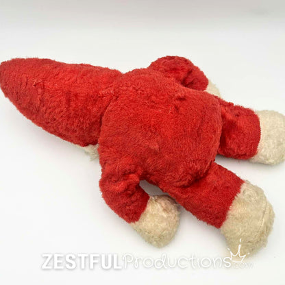 Rear flat lay view of vintage Santa Claus plush doll collectible in red plush suit with white trim. Mid century Rushton style Christmas toy perfect for retro holiday decor, nostalgic displays, and antique collectors.