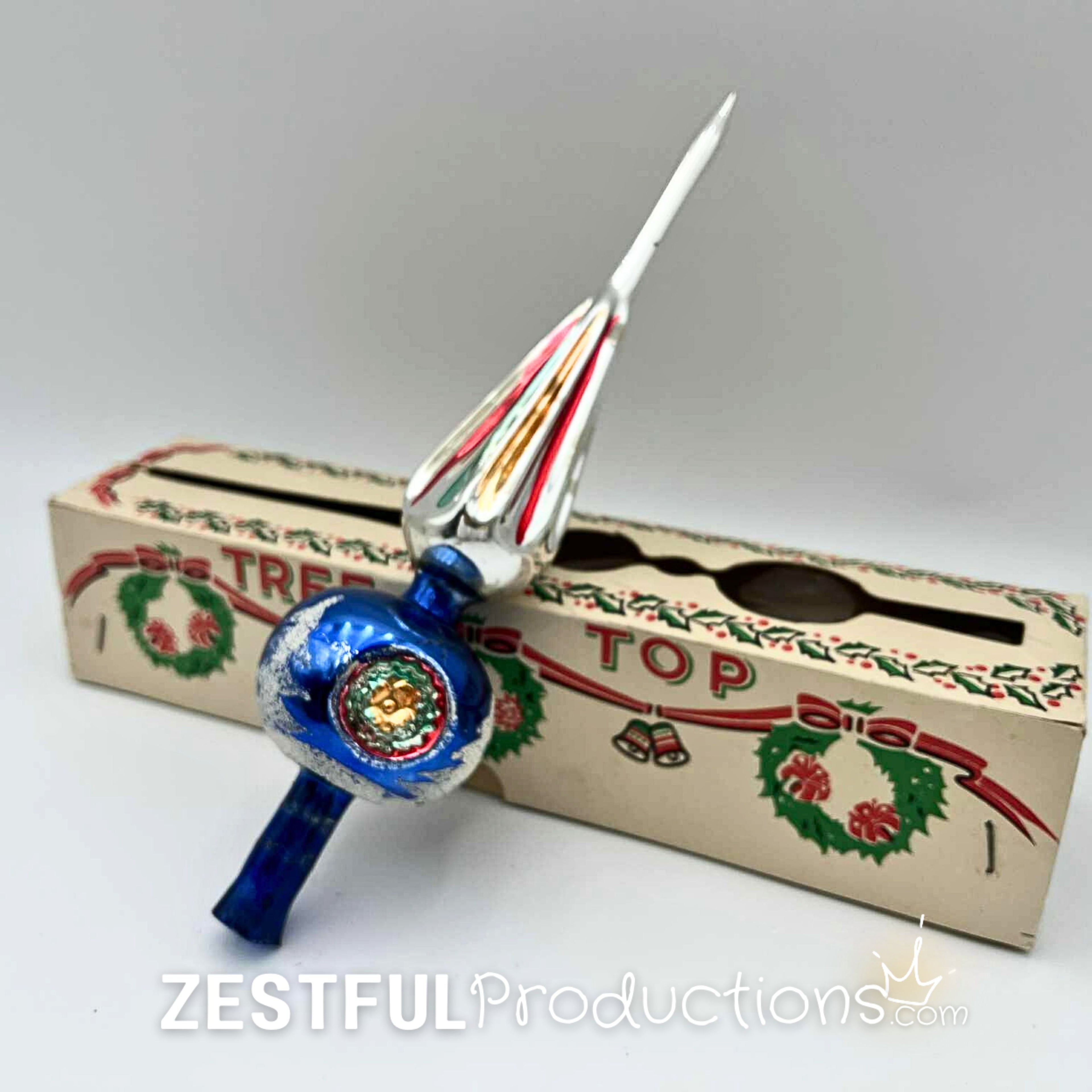 Vintage 1960s mercury glass Christmas tree topper with original box featuring blue handblown glass, silver accents, and retro mid century finial design for antique holiday decor collections.