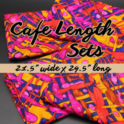 Pair of vintage 1970s cafe length curtain panels in bold abstract pink and orange print.