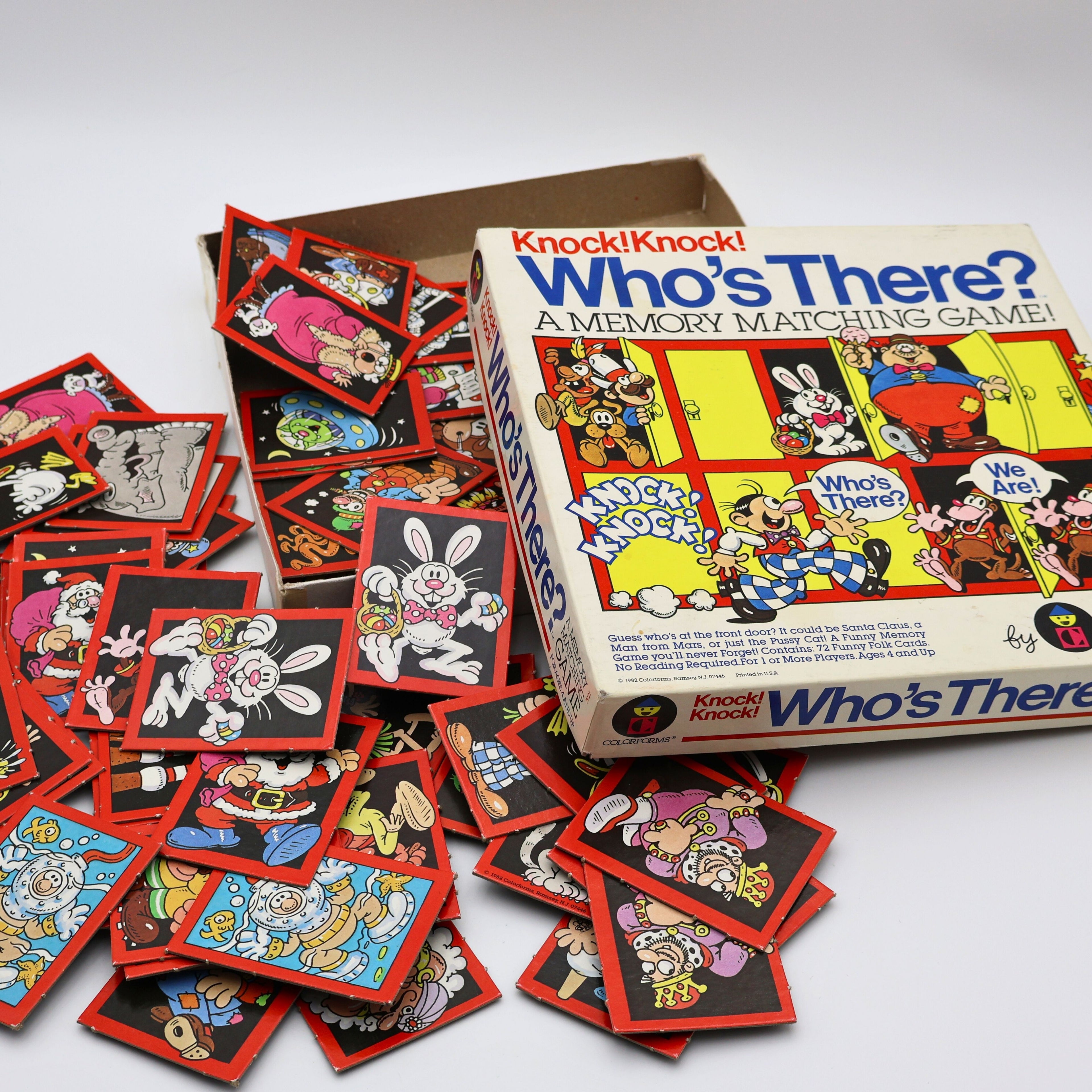 Vintage 1982 Colorforms Knock Knock Who’s There memory matching game with original box and scattered illustrated character cards displayed on white background.