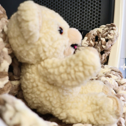 Side profile of an original 1986 Snuggle Bear plush by Lever Brothers and Russ Berrie, showcasing the soft sherpa-style texture, rounded ears, embroidered smile, and well-preserved vintage condition. A wonderful collectible for advertising enthusiasts and nursery decor.