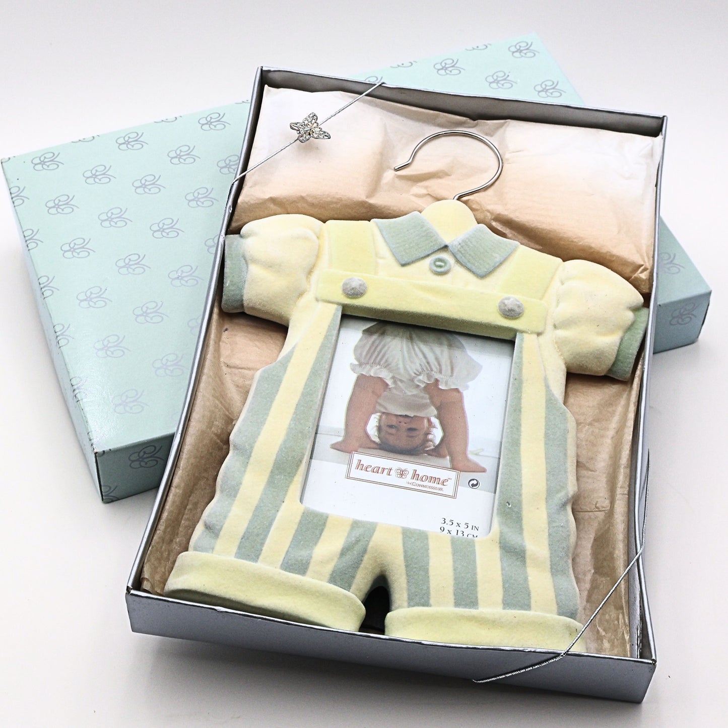 Vintage Heart & Home Connoisseur baby picture frame displayed in original gift box packaging with pastel nursery styling and collectible keepsake presentation