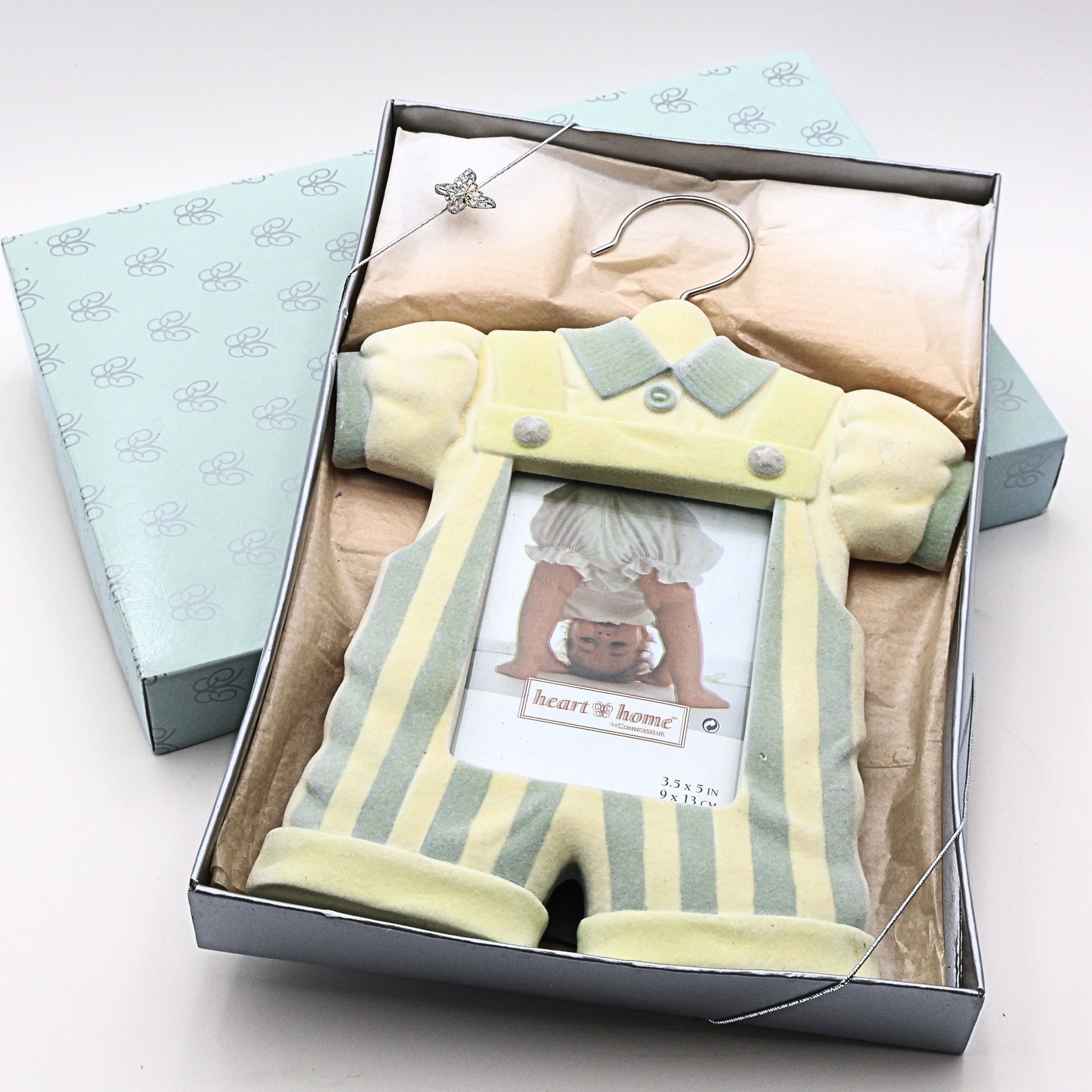Vintage Heart & Home Connoisseur baby picture frame displayed in original gift box packaging with pastel nursery styling and collectible keepsake presentation