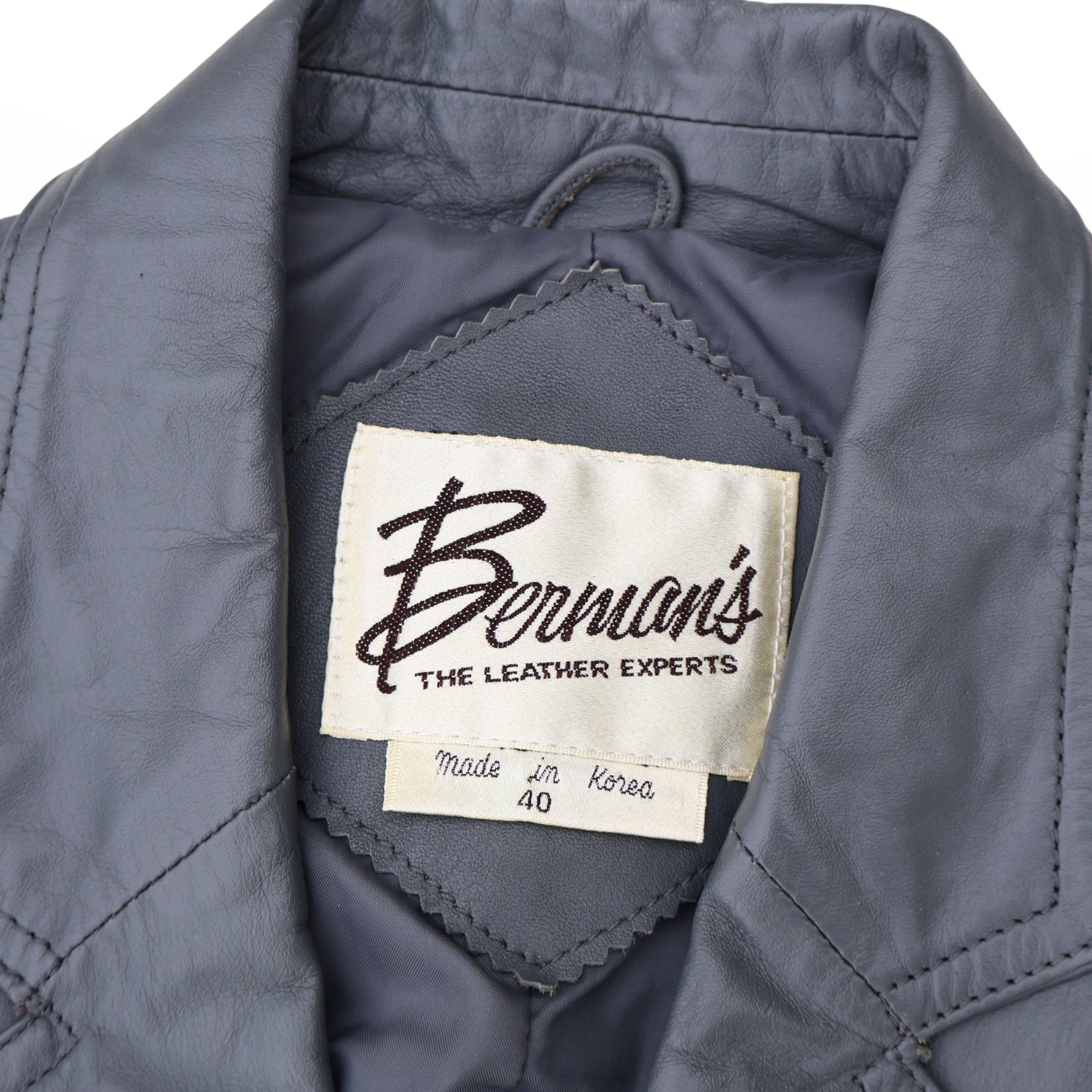 Interior label of Berman’s leather blazer reading The Leather Experts Made in Korea size 40.