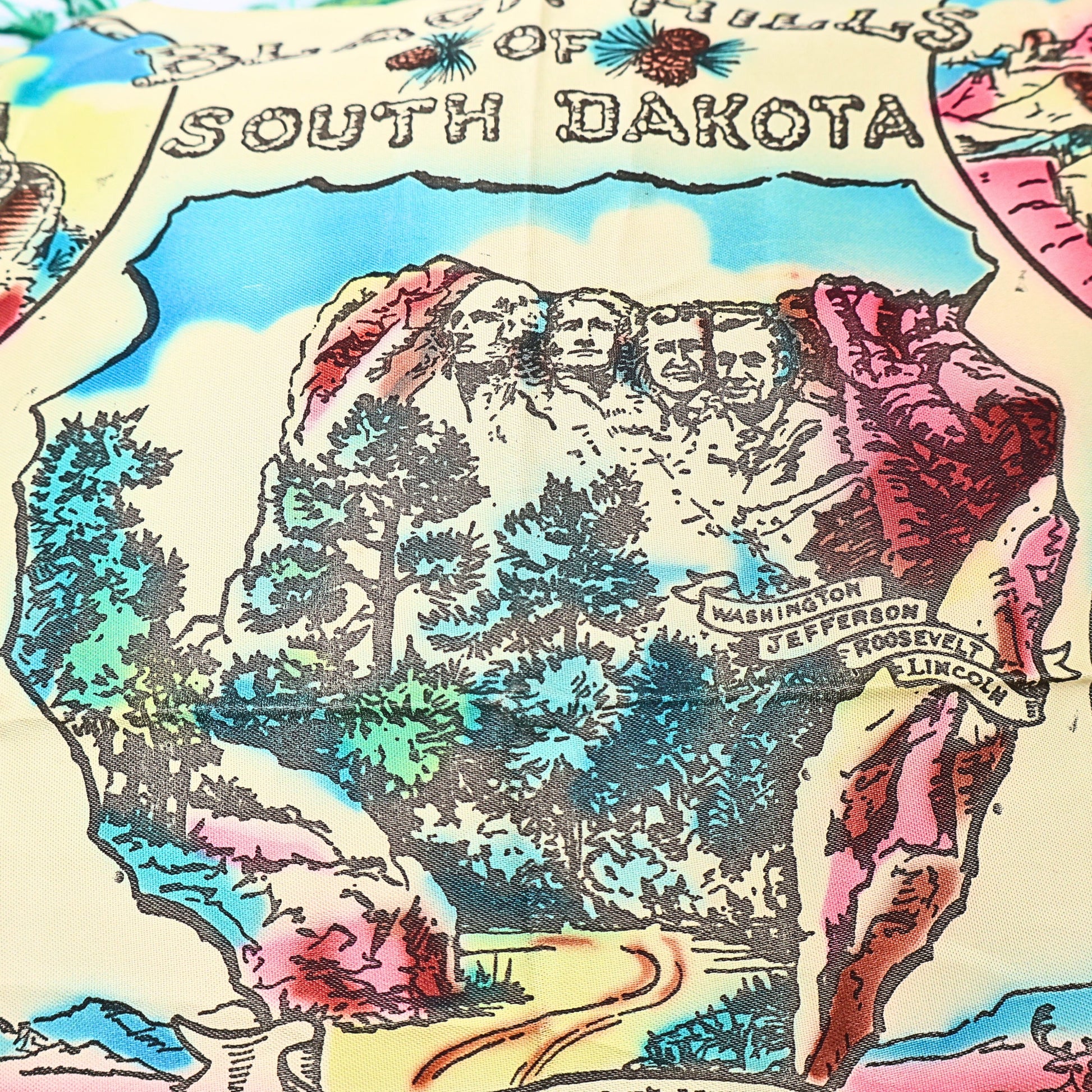 Mount Rushmore illustration on vintage Black Hills souvenir pillowcase