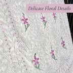 Close-up of the lavender floral embroidery on a vintage white chenille bedspread, highlighting the intricate hand-tufted craftsmanship and raised texture. Perfect inspiration for cottage decor, farmhouse bedding, vintage bedroom styling, and heirloom textile collectors.