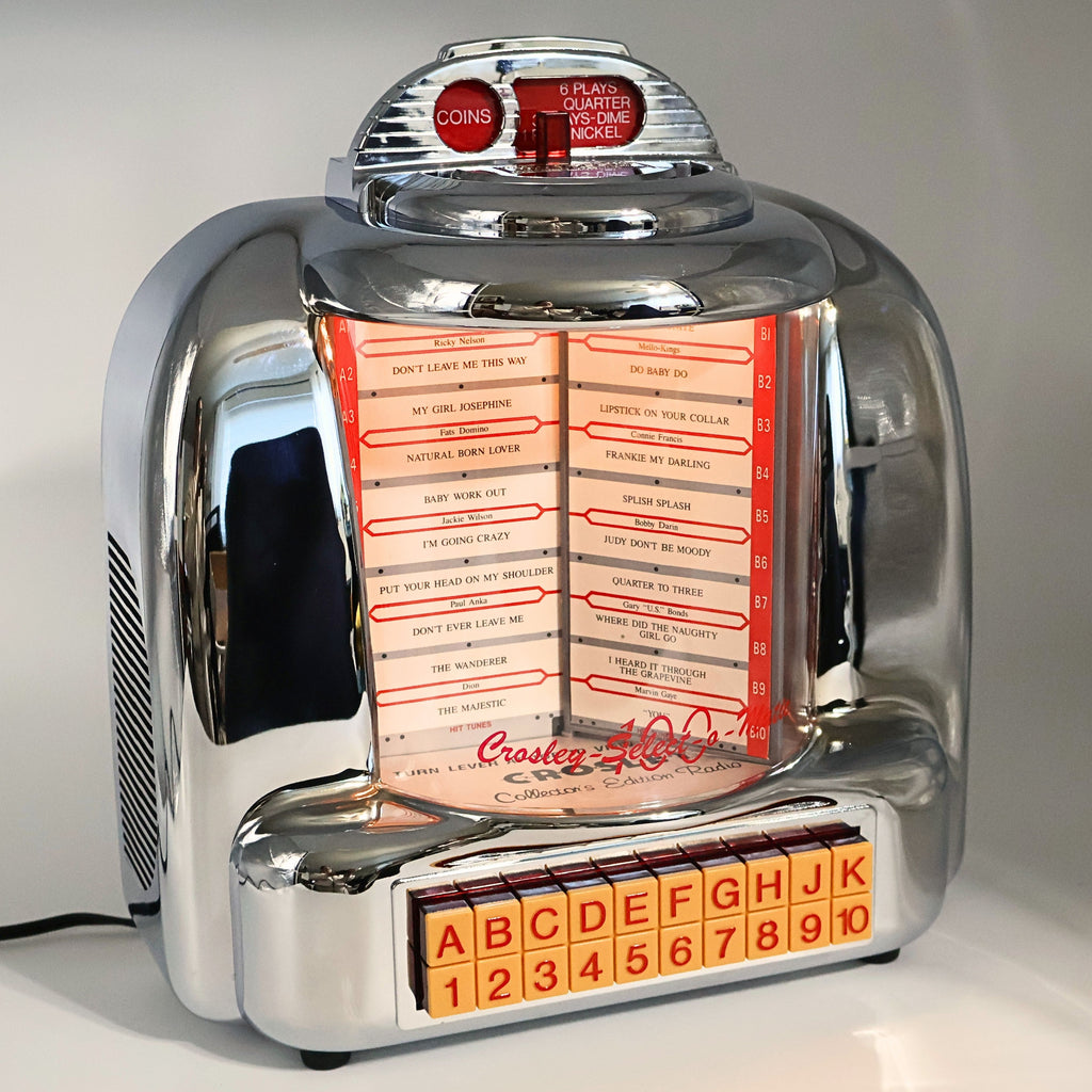 Vintage Crosley Jukebox Radio CR-9 Select-O-Matic retro 1950s diner style music player with chrome finish, illuminated song selector, AM FM radio and cassette player, nostalgic collectible decor piece for home or office