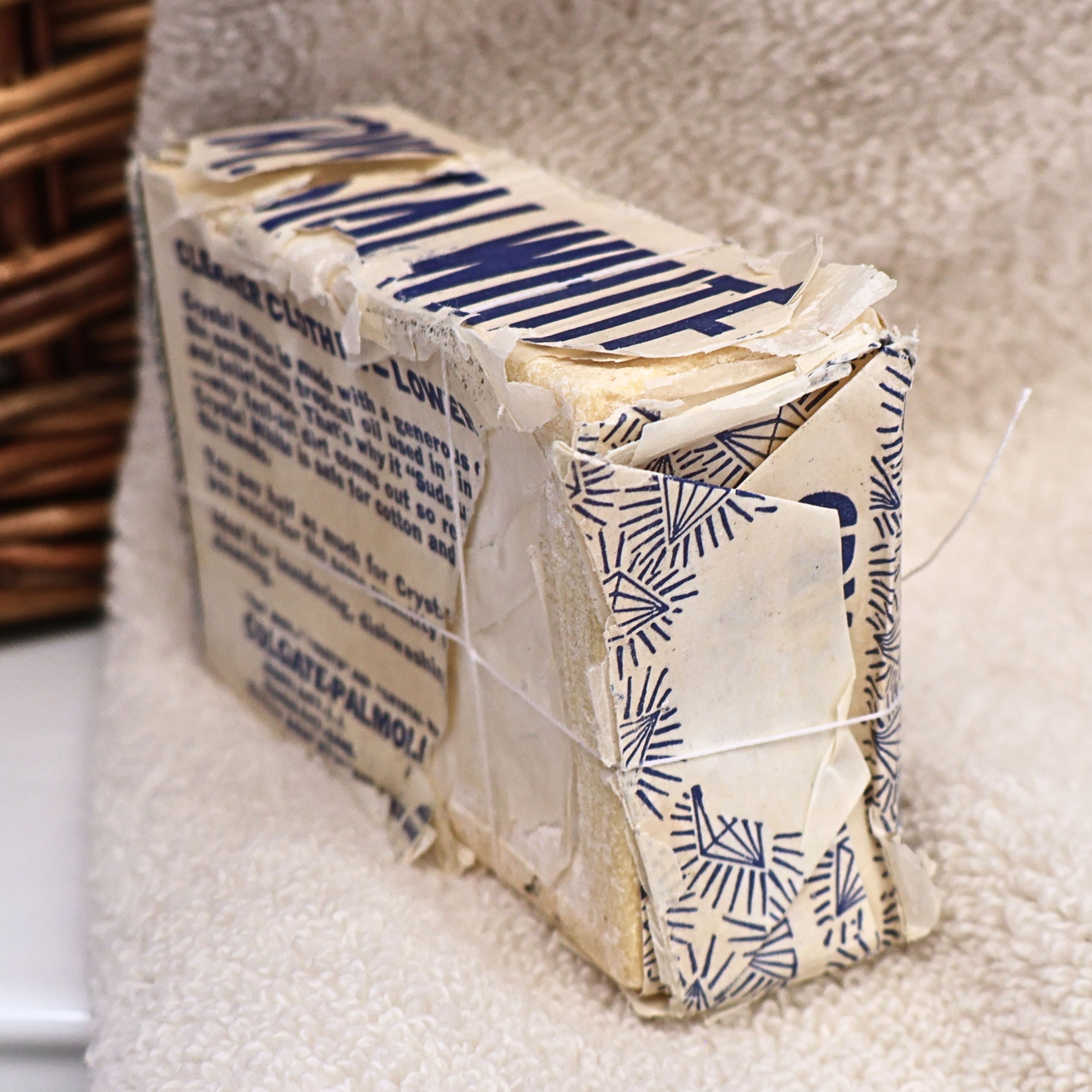Back of an authentic Crystal White Family Soap wrapper displaying original product information from Colgate-Palmolive-Peet. This vintage laundry soap bar retains its historic packaging and makes a charming advertising collectible for Americana displays, farmhouse decor, and vintage home collections.