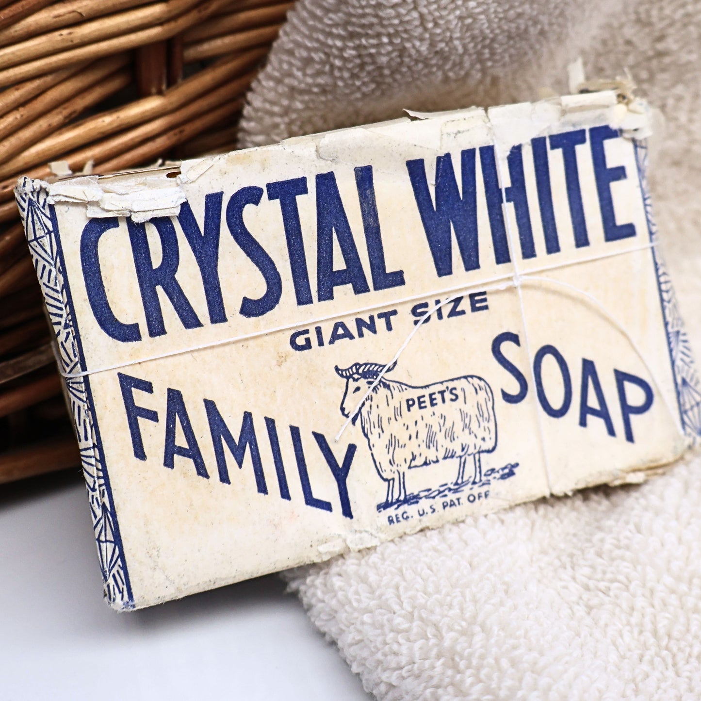 Authentic vintage Crystal White Family Soap in its original Colgate-Palmolive-Peet paper wrapper featuring the classic Peet's sheep logo. This mid-century laundry soap bar is a wonderful advertising collectible for farmhouse decor, vintage laundry room displays, Americana collections, and nostalgic home styling.