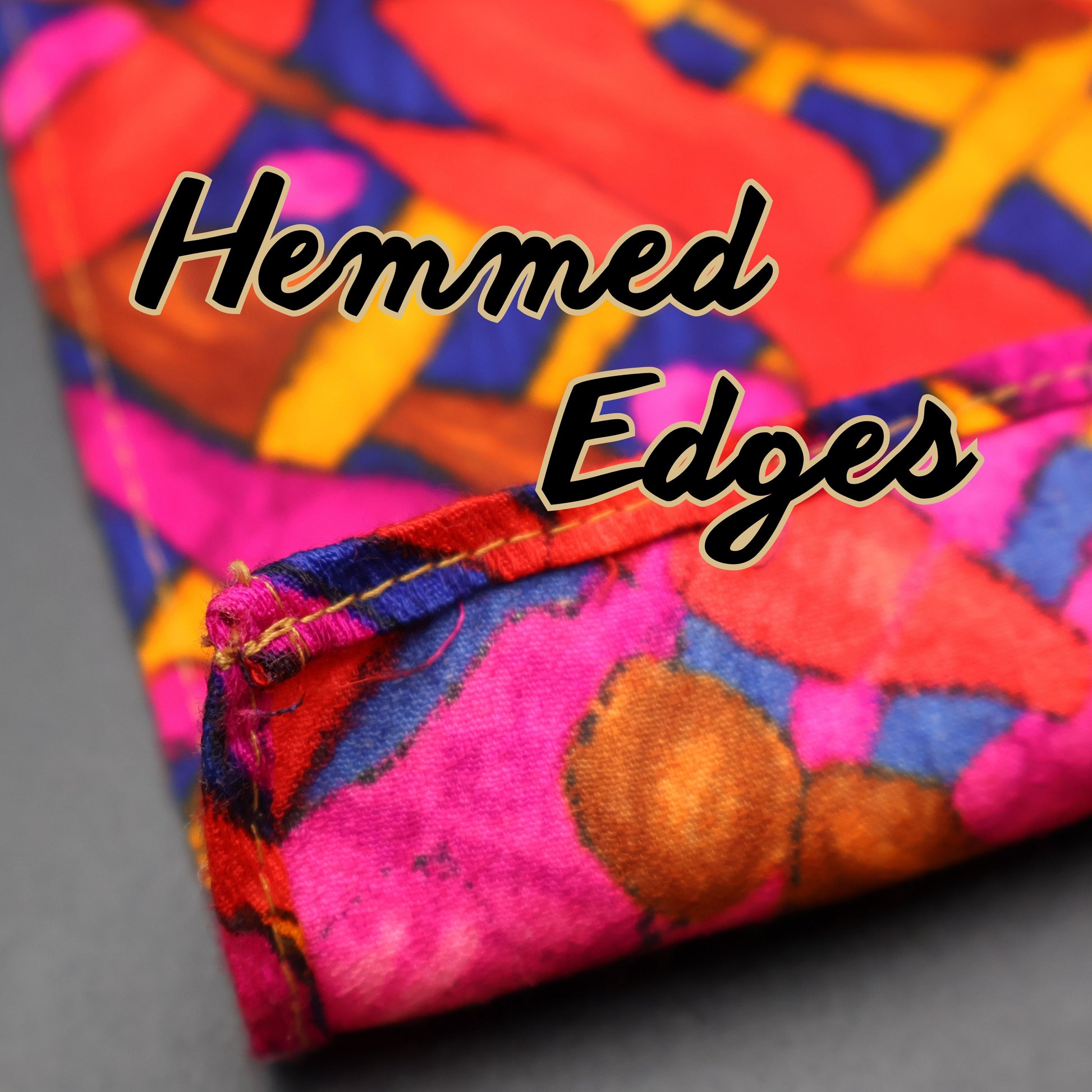 Close-up of hemmed edge on vintage psychedelic curtain panel with finished stitching.