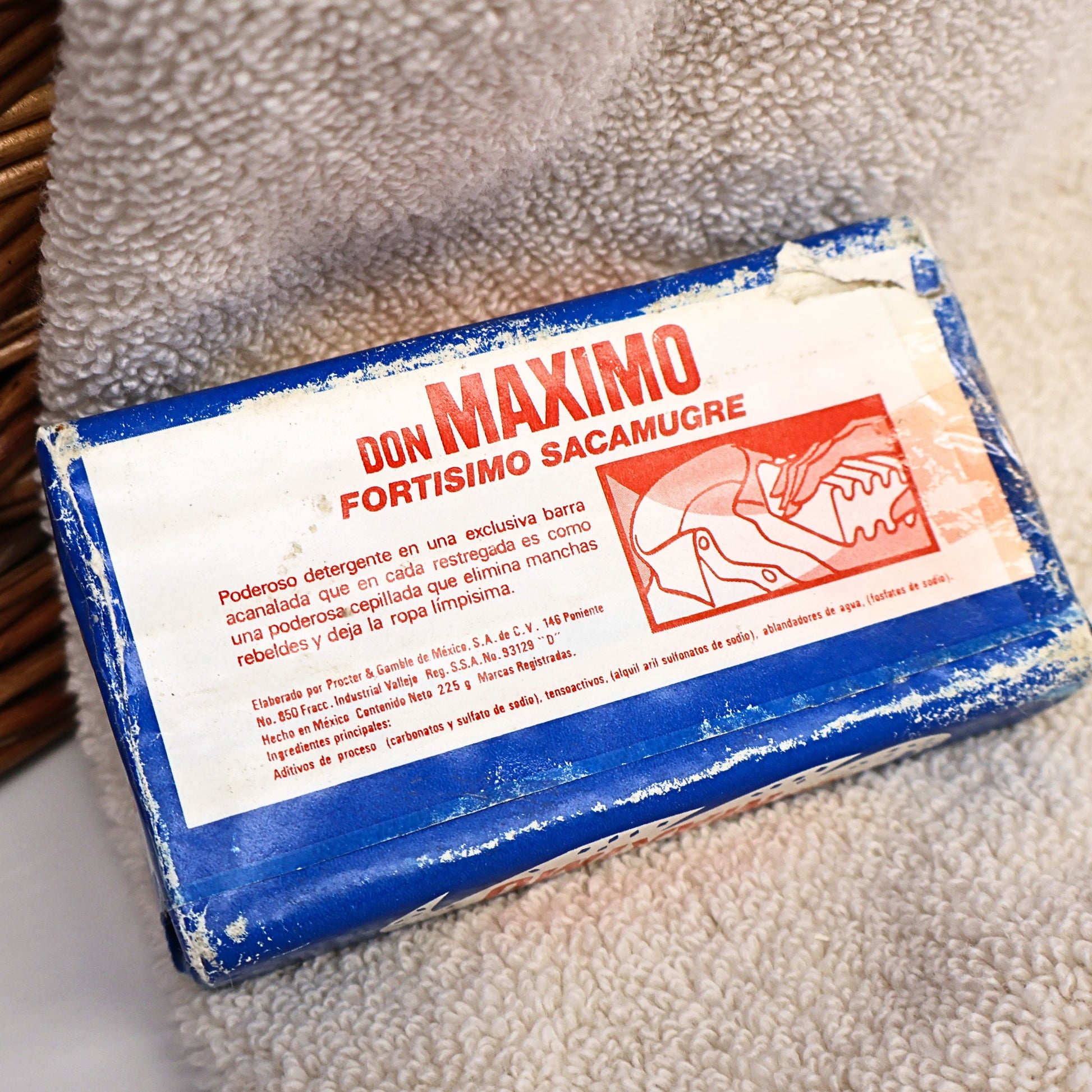 Back of an authentic Don Maximo Laundry Soap wrapper displaying original Spanish product information and graphics from Procter & Gamble de Mexico. This vintage detergent bar is a wonderful advertising collectible for international memorabilia collections, vintage laundry room decor, shelf displays, and nostalgic home styling.