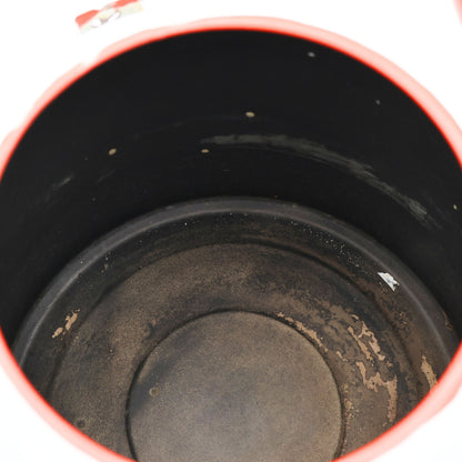 Interior of antique enamel coffee kettle showing aged patina and authentic vintage wear