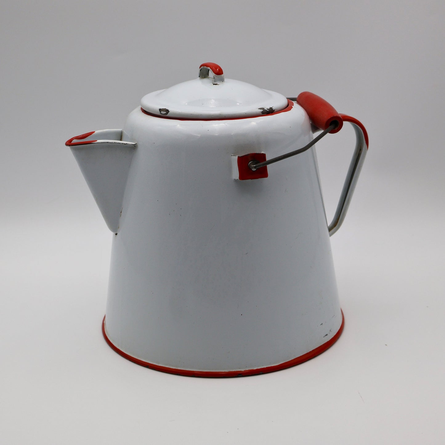 Vintage enamelware coffee kettle in white with red trim, rustic ranch kitchen decor piece