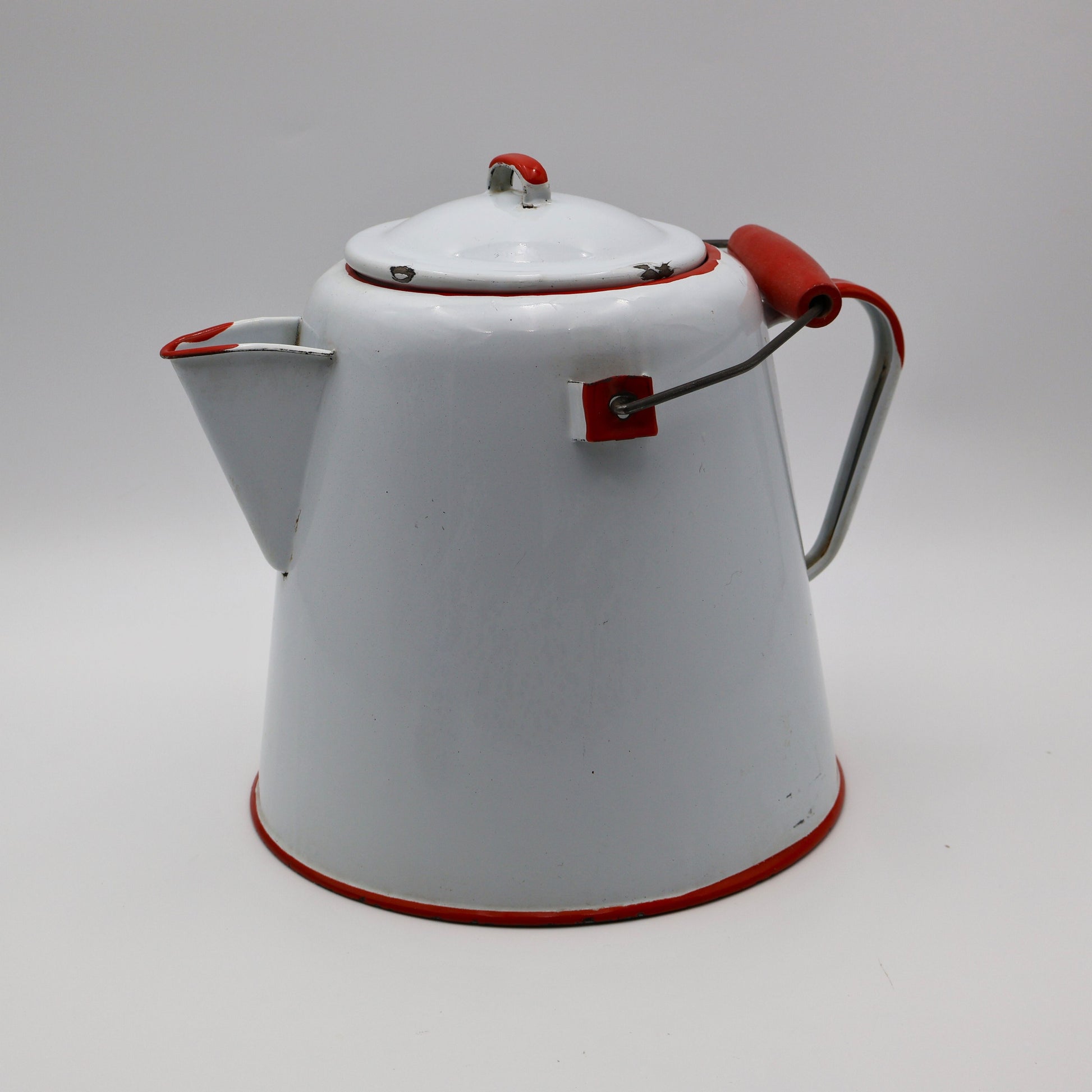Vintage enamelware coffee kettle in white with red trim, rustic ranch kitchen decor piece