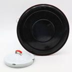 Bottom view of large vintage enamel coffee pot with blackened interior base from age