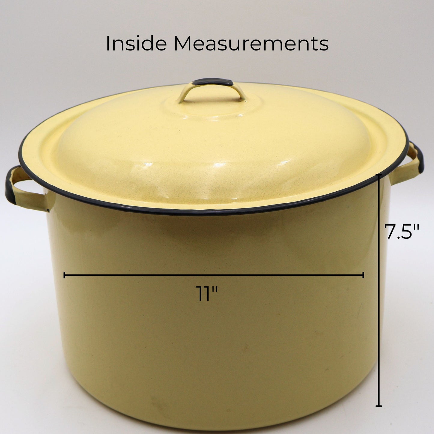 Vintage yellow enamelware stock pot with matching lid shown with approximate measurements of 11 inches in diameter and 7.5 inches tall. A large vintage farmhouse kitchen piece ideal for decorating, storage, and collecting.