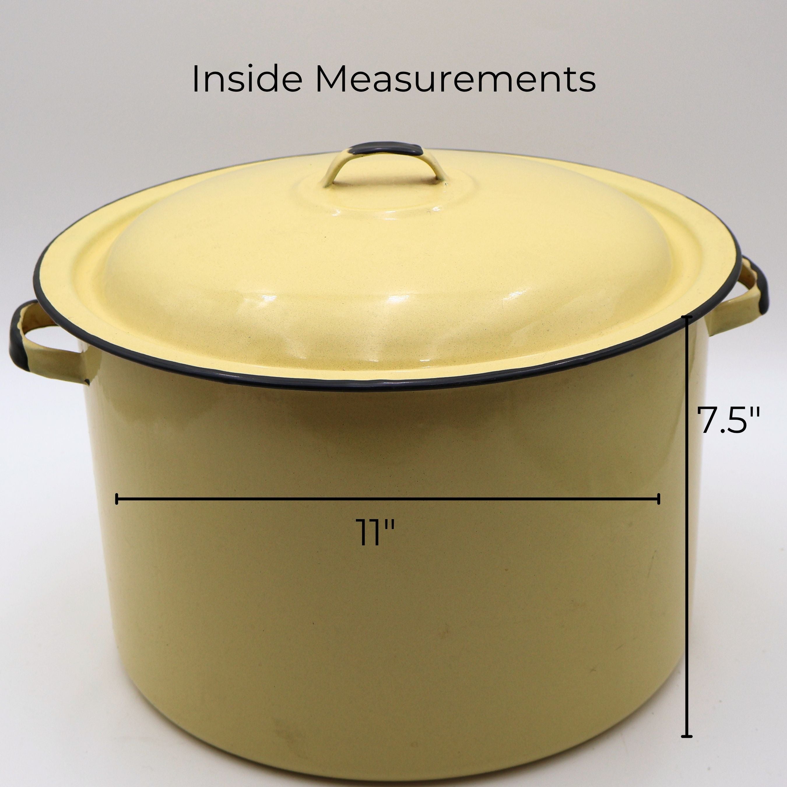 Vintage yellow enamelware stock pot with matching lid shown with approximate measurements of 11 inches in diameter and 7.5 inches tall. A large vintage farmhouse kitchen piece ideal for decorating, storage, and collecting.