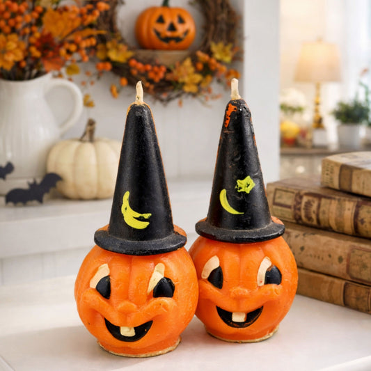 Vintage Gurley pumpkin candle set with witch hats styled in a home setting, mid century Halloween decor on white shelf with fall accents