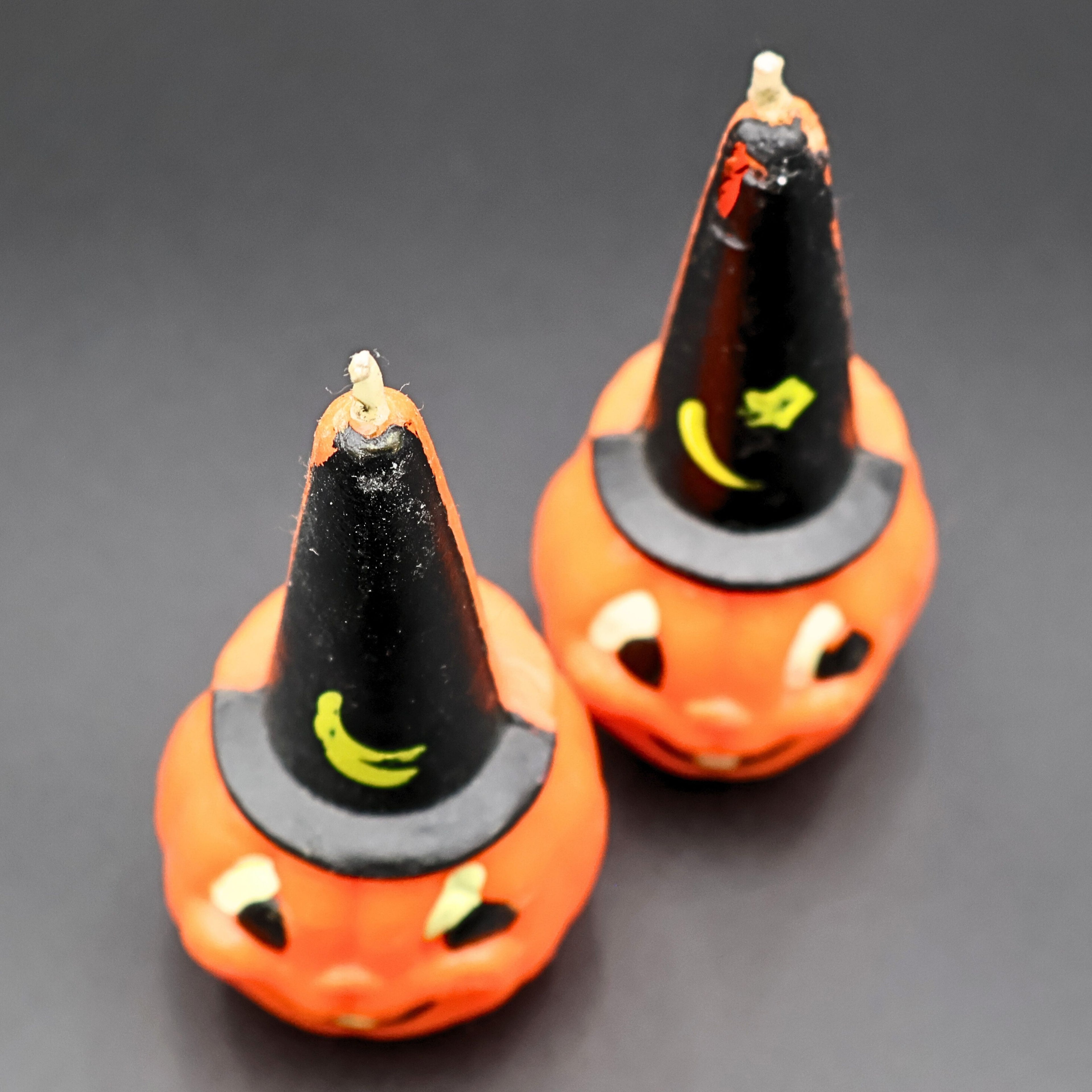 Vintage Gurley pumpkin candle set styled together, mid century Halloween decor collectible pair