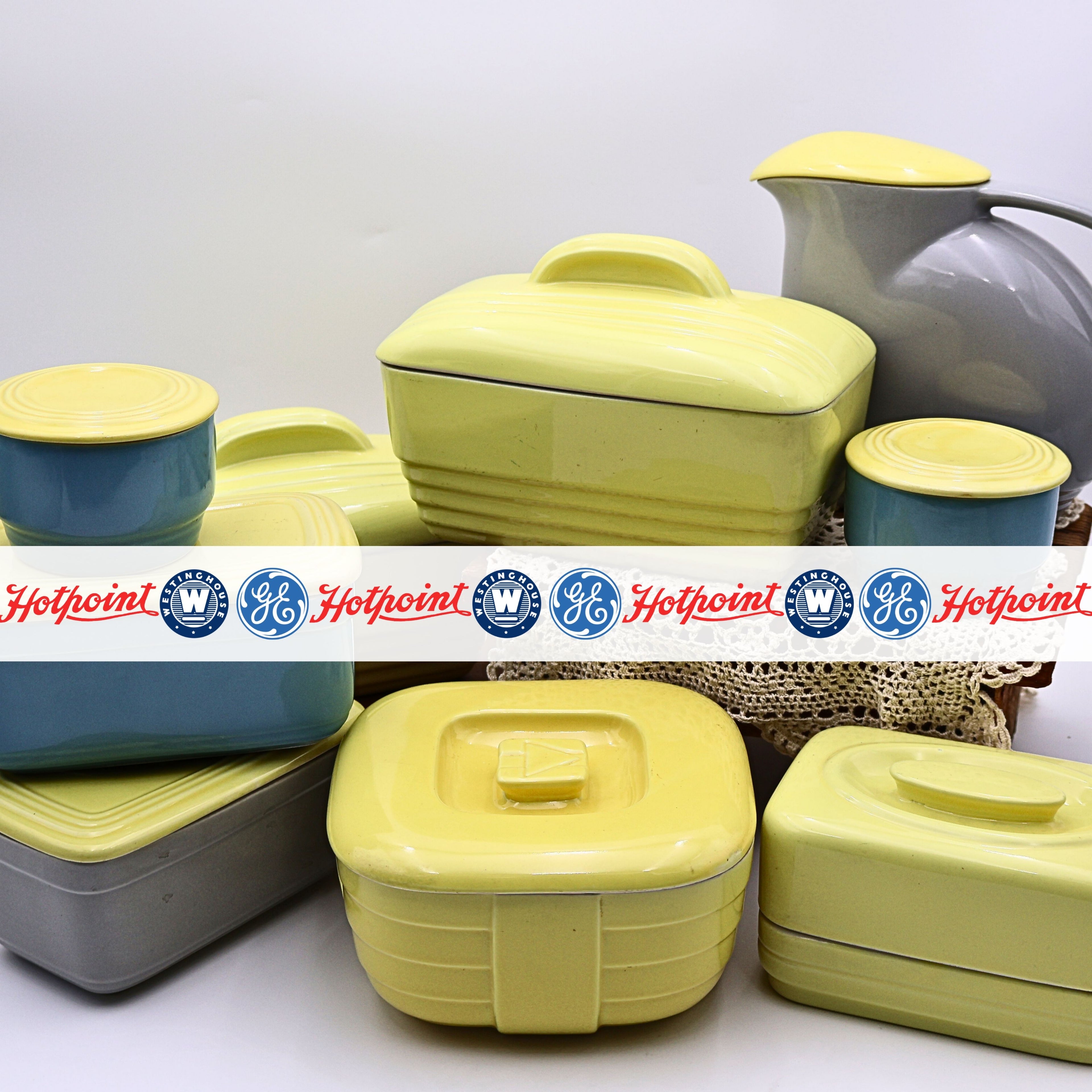 Vintage Hall China kitchen containers set in yellow and blue retro food storage tins and pitcher styled together on white background mid century kitchenware collection