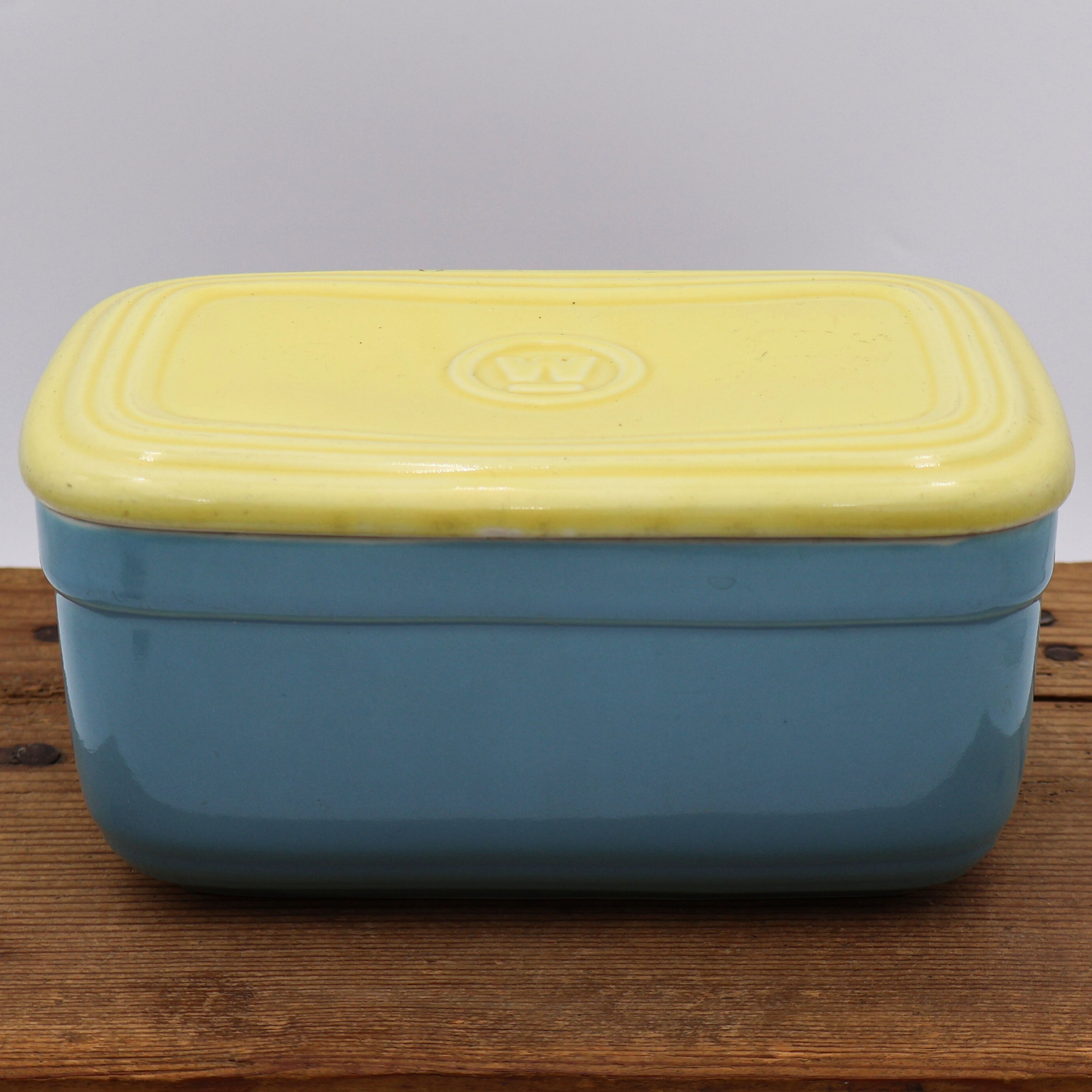 Vintage Hall China Westinghouse refrigerator dish in blue with butter yellow lid, mid century 1950s lidded storage container.