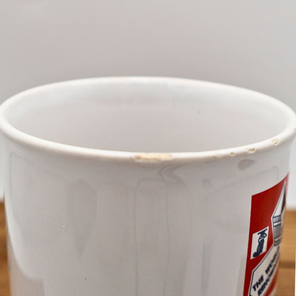 Close up view of vintage Jamaica souvenir mug