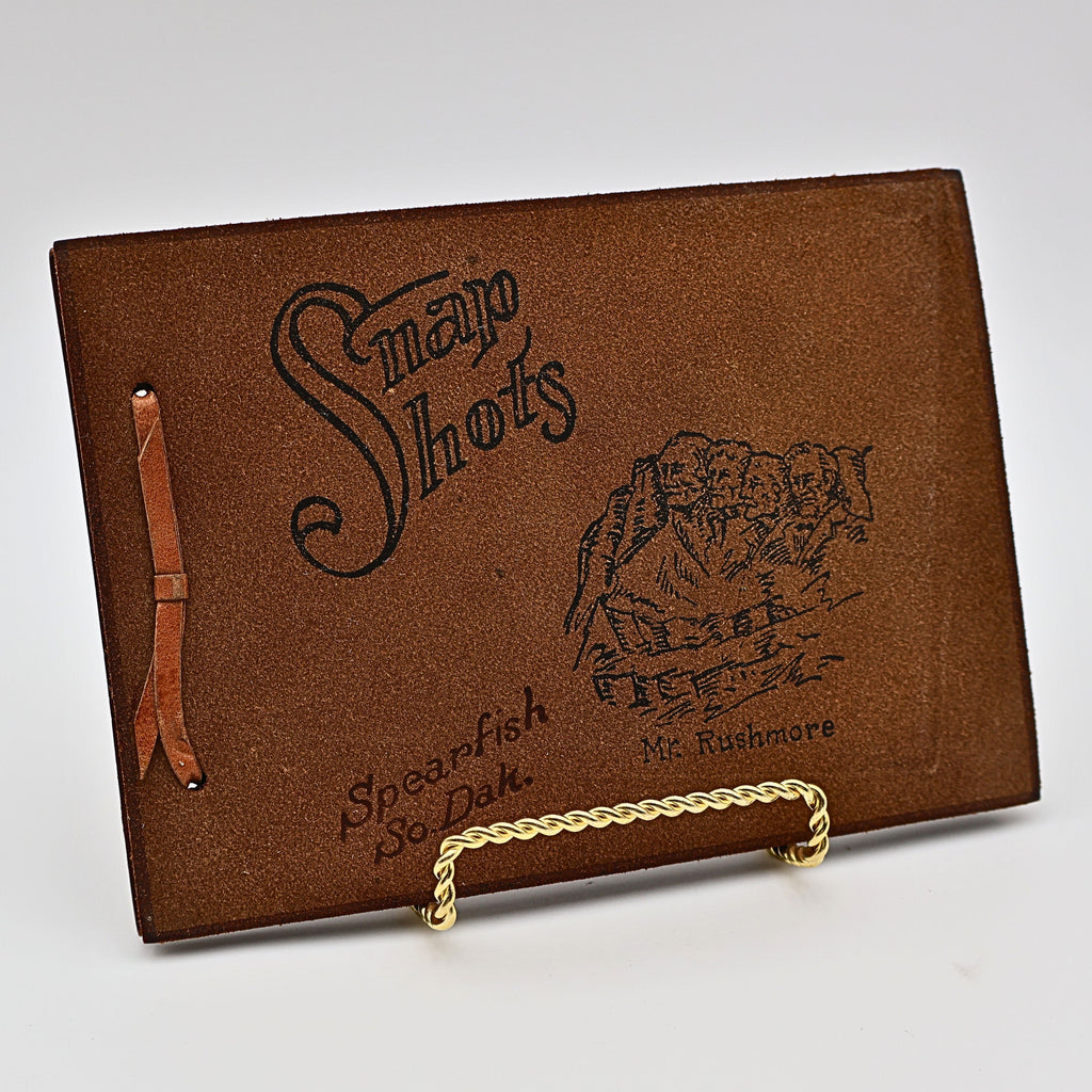 Front cover of vintage leather Snap Shots photo album