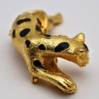 Side view of vintage leopard brooch pin showing sculptural gold-tone design
