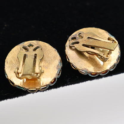 Back view of vintage Mount Rushmore clip-on earrings with unmarked backs