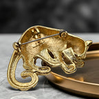 Back of Park Lane leopard brooch with signed pin closure
