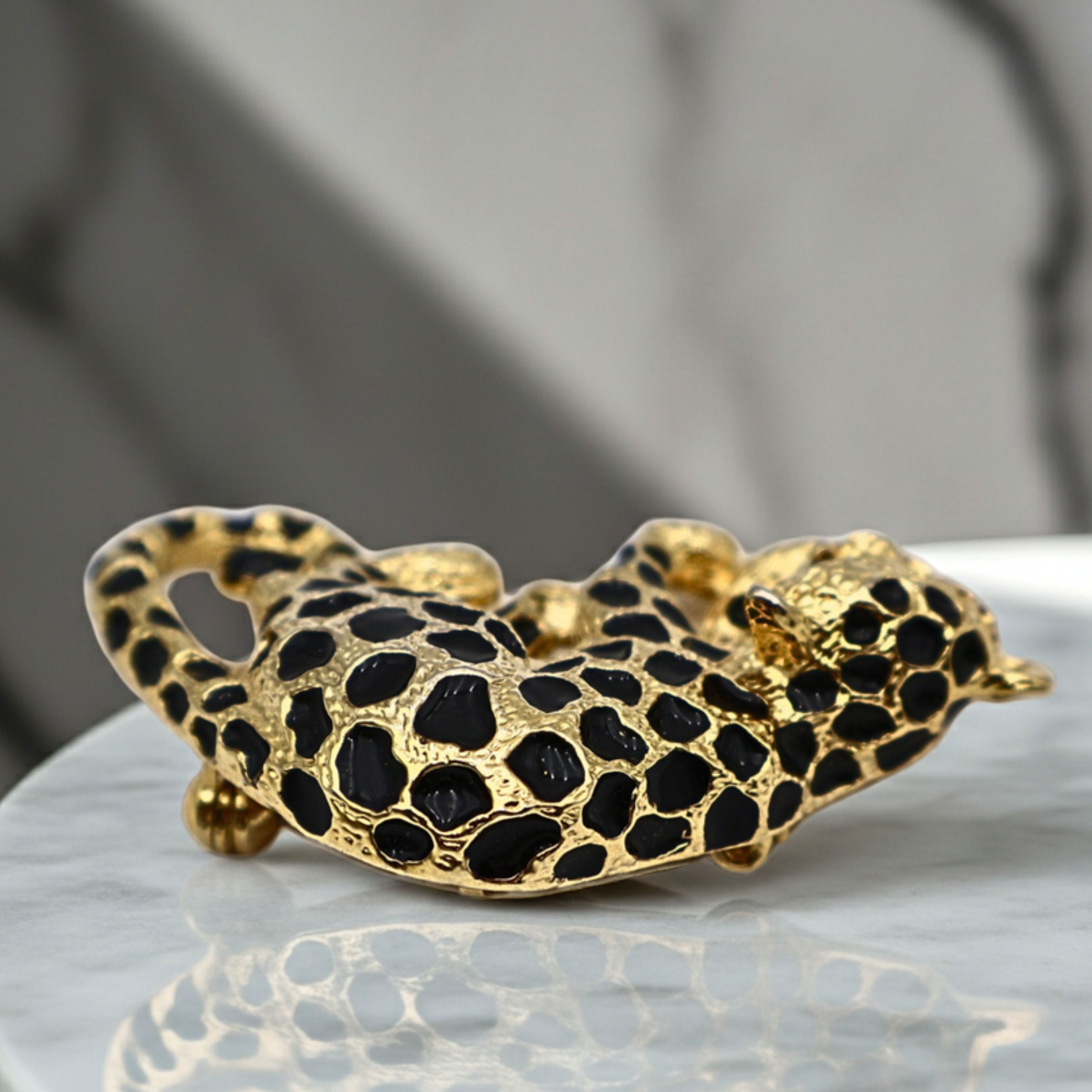 Top of Park Lane leopard brooch with signed Park Lane pin closure