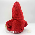 Back view of vintage Santa Claus plush doll collectible with pointed red hood and plush body. Rushton style 1950s Christmas decor piece featuring classic mid century holiday character and nostalgic retro styling.