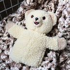 Full front view of a vintage Snuggle Bear hand puppet with raised arms and cheerful embroidered expression. This 1986 Lever Brothers plush mascot is a wonderful addition to advertising memorabilia, childhood nostalgia collections, or vintage home decor.