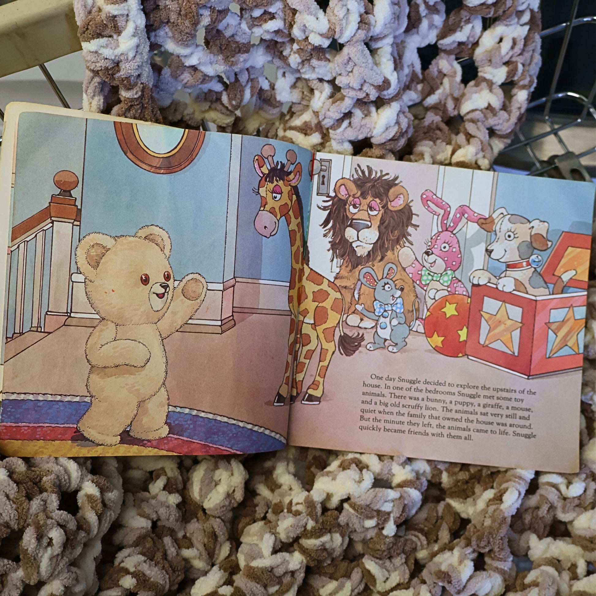 Illustrated interior pages from the vintage Snuggle Saves the Day storybook featuring Snuggle Bear meeting colorful animal friends. Bright original artwork from this collectible 1987 Lever Brothers advertising publication with nostalgic household branding.
