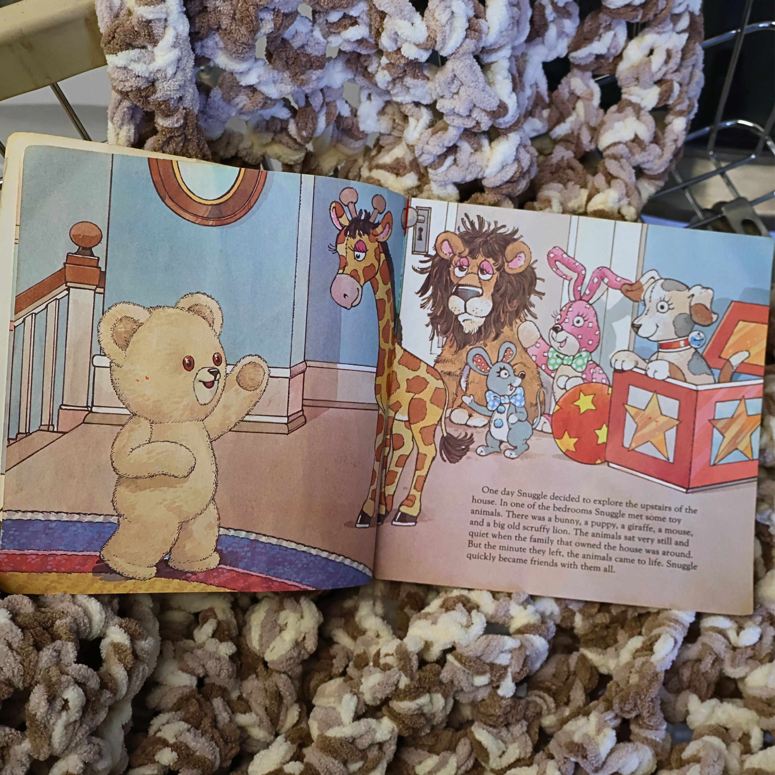Illustrated interior pages from the vintage Snuggle Saves the Day storybook featuring Snuggle Bear meeting colorful animal friends. Bright original artwork from this collectible 1987 Lever Brothers advertising publication with nostalgic household branding.