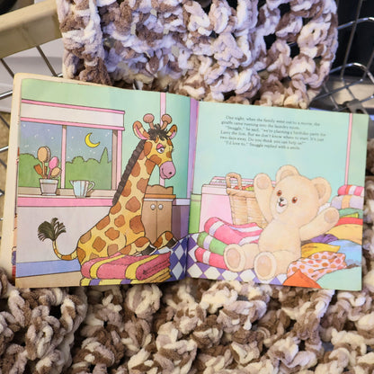 Colorful birthday party illustrations inside the original 1987 Snuggle Saves the Day storybook featuring Snuggle Bear and friends. Vintage Lever Brothers advertising collectible with charming Golden Books artwork for nostalgic paper memorabilia collectors.