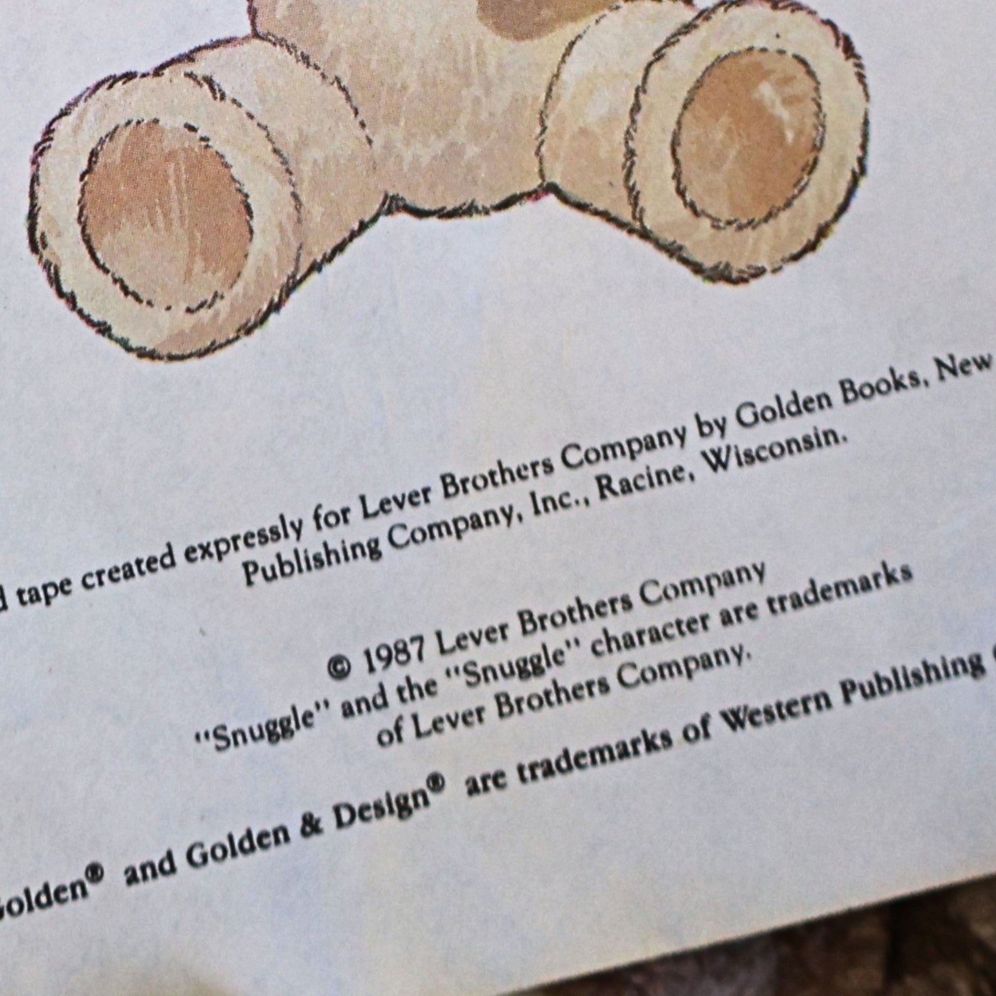 Close-up of the copyright page inside the vintage Snuggle Saves the Day storybook displaying the 1987 Lever Brothers Company copyright and Golden Books publishing information, documenting the history of this collectible advertising storybook.