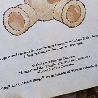 Close-up of the copyright page inside the vintage Snuggle Saves the Day storybook displaying the 1987 Lever Brothers Company copyright and Golden Books publishing information, documenting the history of this collectible advertising storybook.
