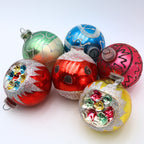 Vintage West Germany reflector ornament set with colorful mercury glass Christmas baubles in blue green red yellow and pink