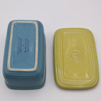 Bottom view of vintage Hall China refrigerator dish and matching yellow lid, Westinghouse promotional kitchenware.