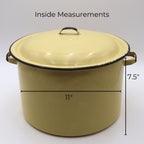 Vintage yellow enamelware stock pot shown with measurement reference displaying an approximate 11-inch diameter and 7.5-inch height. This large lidded farmhouse cookware piece makes a beautiful display in country kitchens, cottage homes, and vintage collections.