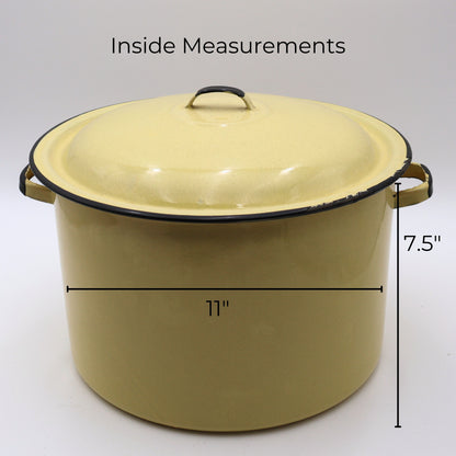 Vintage yellow enamelware stock pot shown with measurement reference displaying an approximate 11-inch diameter and 7.5-inch height. This large lidded farmhouse cookware piece makes a beautiful display in country kitchens, cottage homes, and vintage collections.