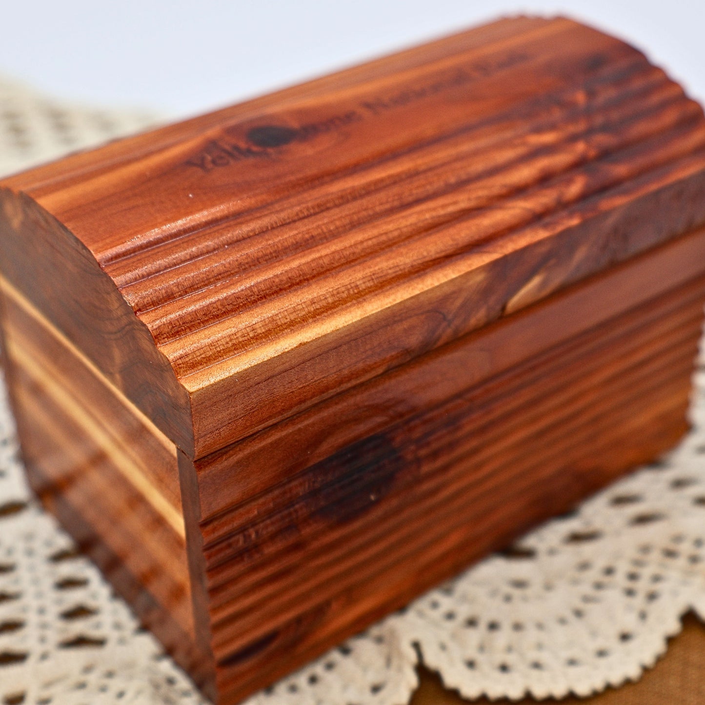 Side view of vintage cedar keepsake box